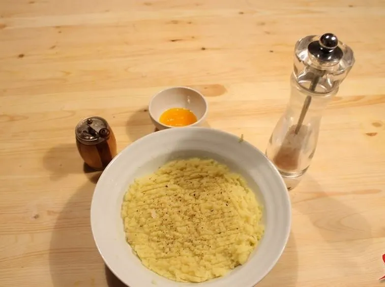 Schiacciare patate