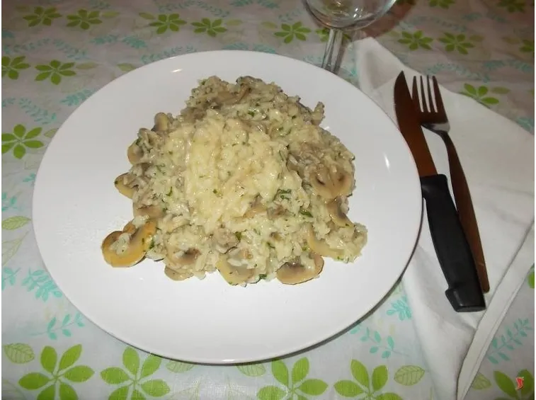 Il risotto salsiccia e funghi
