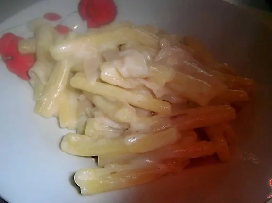 Pasta con besciamella al prosciutto