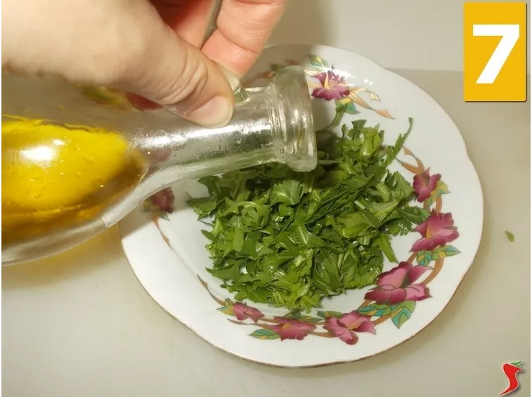 Condire la rucola