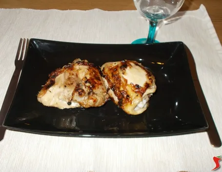 Le cosce di pollo alla griglia