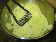 schiacciare le patate