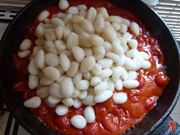 aggiungere gli gnocchi al sugo