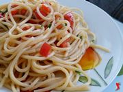 spaghetti con pomodorini e colatura di alici